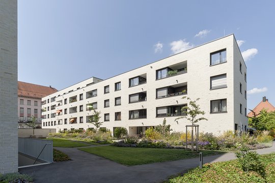 Allmand-Carré – vier Wohn- und Geschäftshäuser